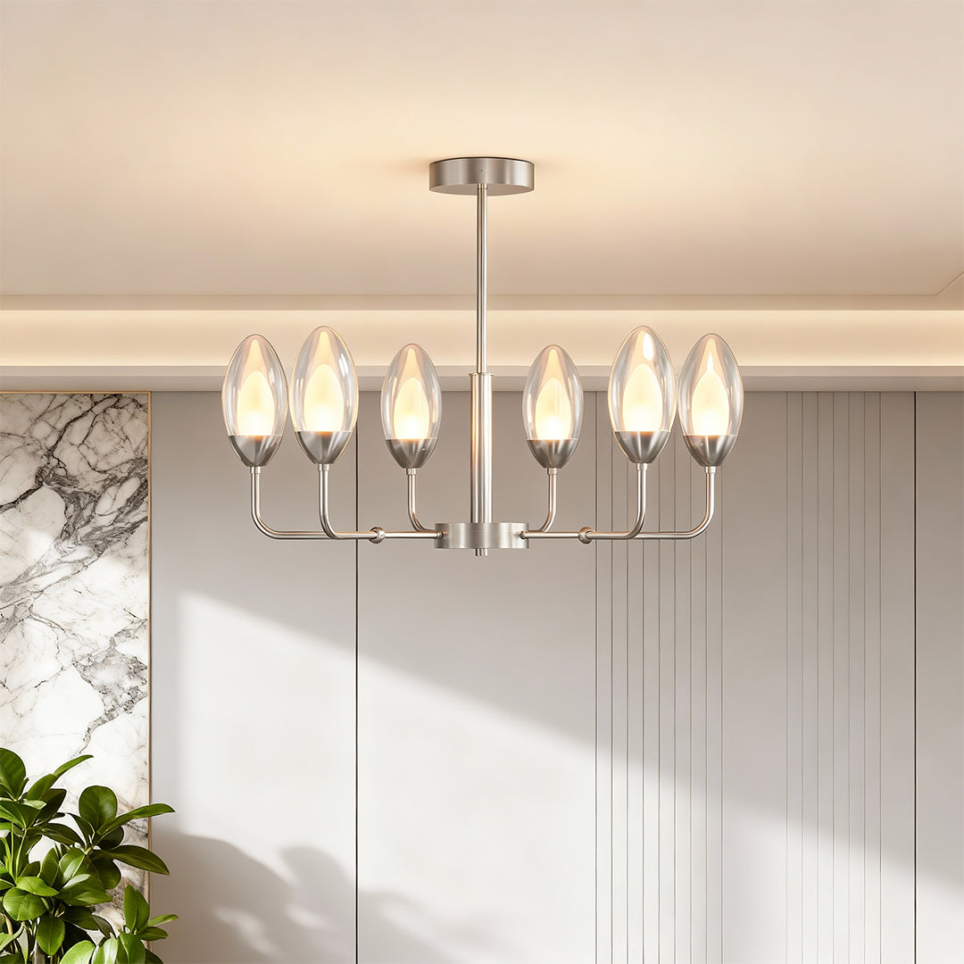 Minimalist chandelier in a white natural toned dining room