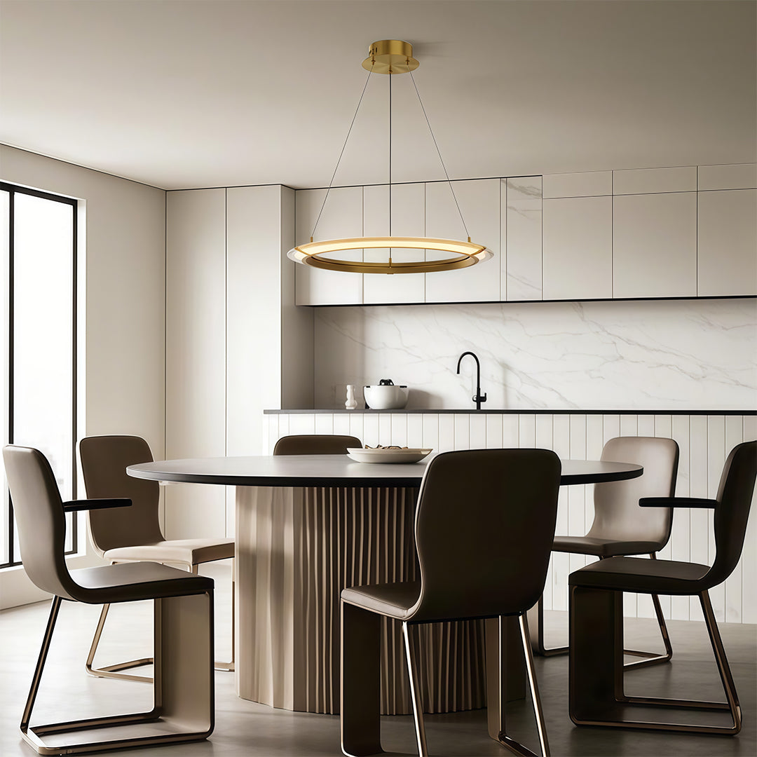 Dual rings of the chandelier suspended above a dining table
