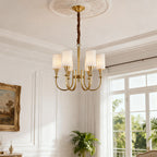 Copper chandelier in an elegant living room with white walls