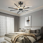 Geometric starburst LED fan light mounted in a bedroom