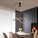 Sleek gold and black chandelier lines in a contemporary living room