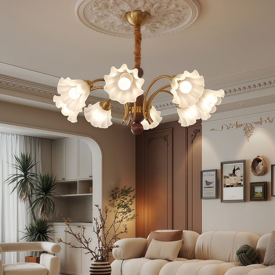 Vintage glass chandelier in an elegant dining room with blue curtains