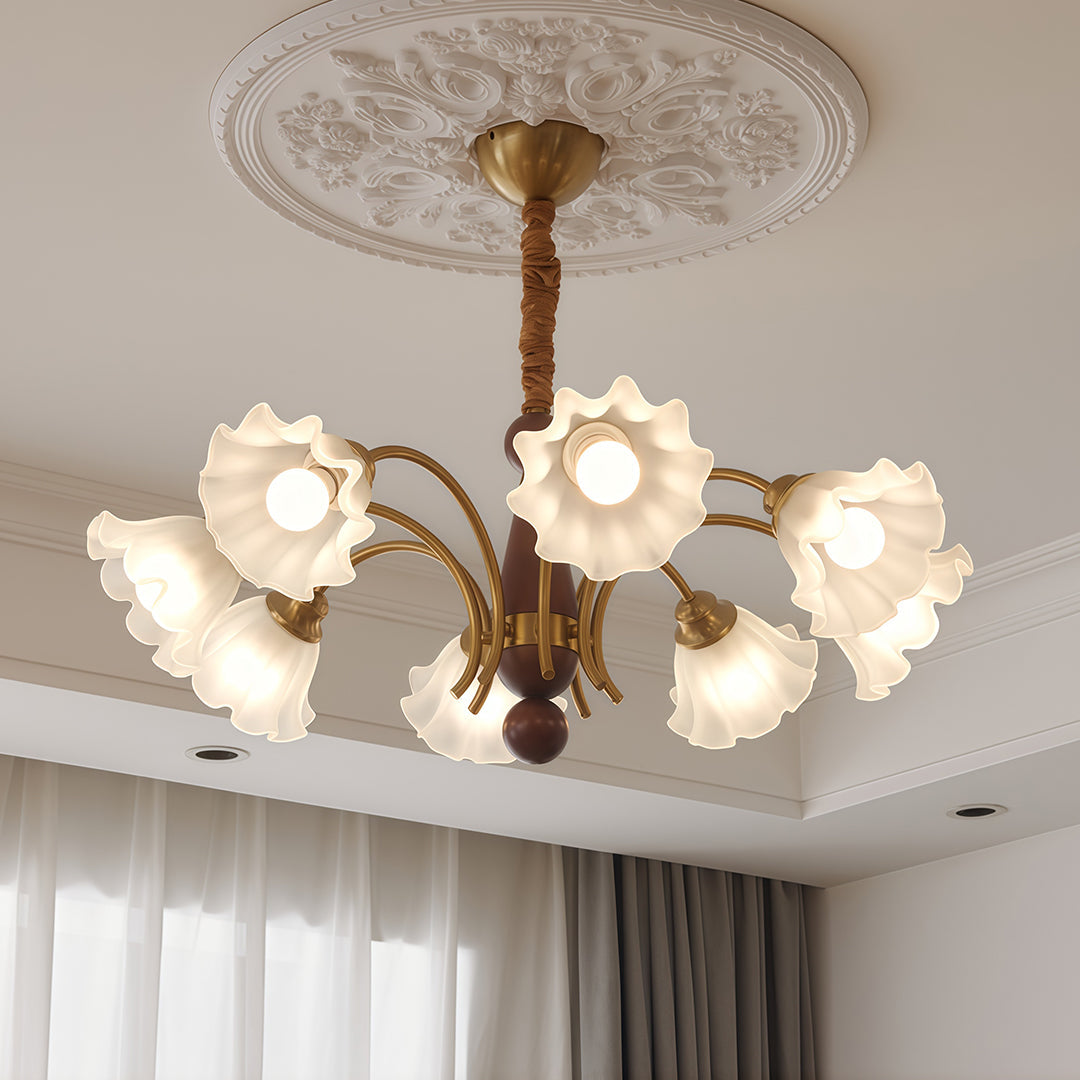 Chandelier in a contemporary bedroom with a grey ceiling rosette