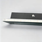Close-up detail of the LED diffuser on the sconce
