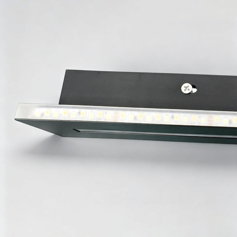 Close-up detail of the LED diffuser on the sconce