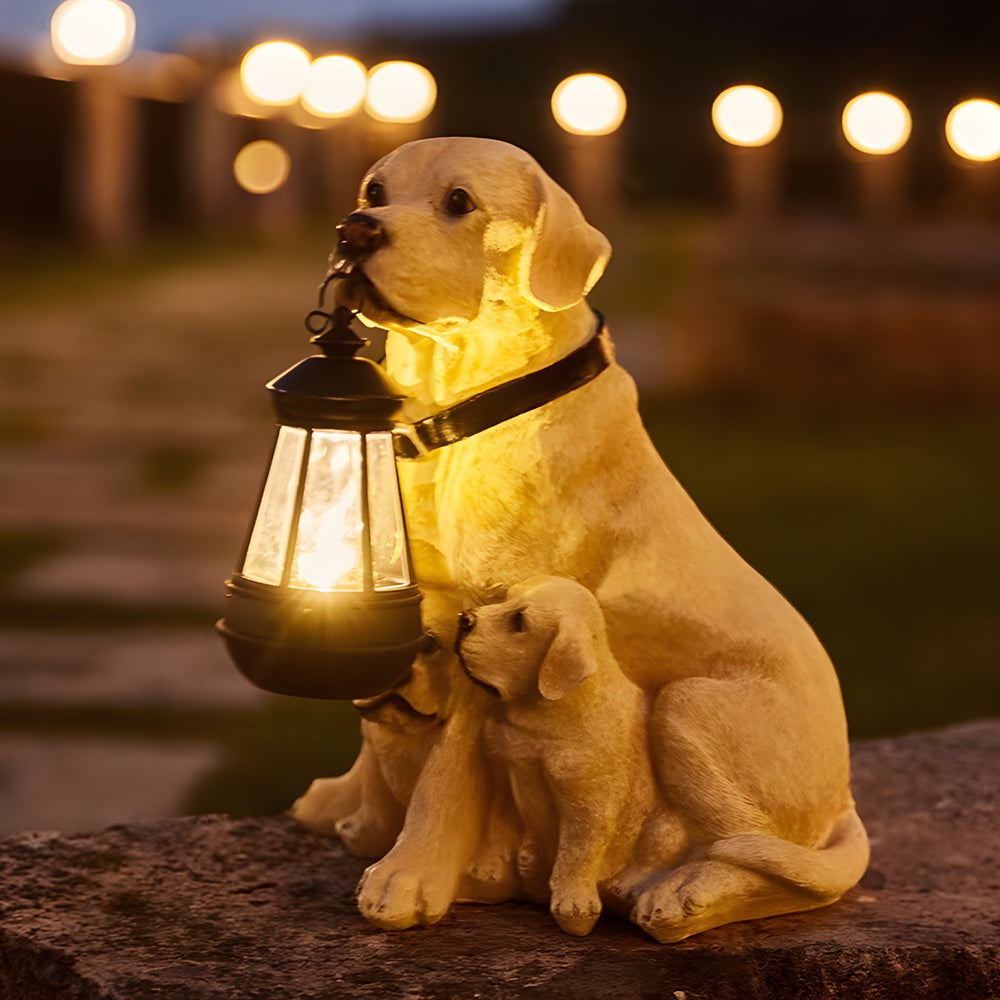 Golden retriever statue solar light shown with a puppy figure