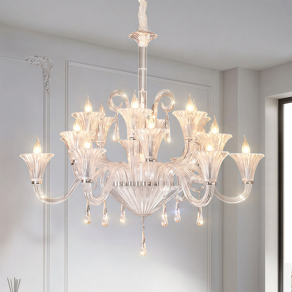 Art glass chandelier in a minimalist white bedroom