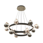 Dual tier chandelier with graduated glass spheres