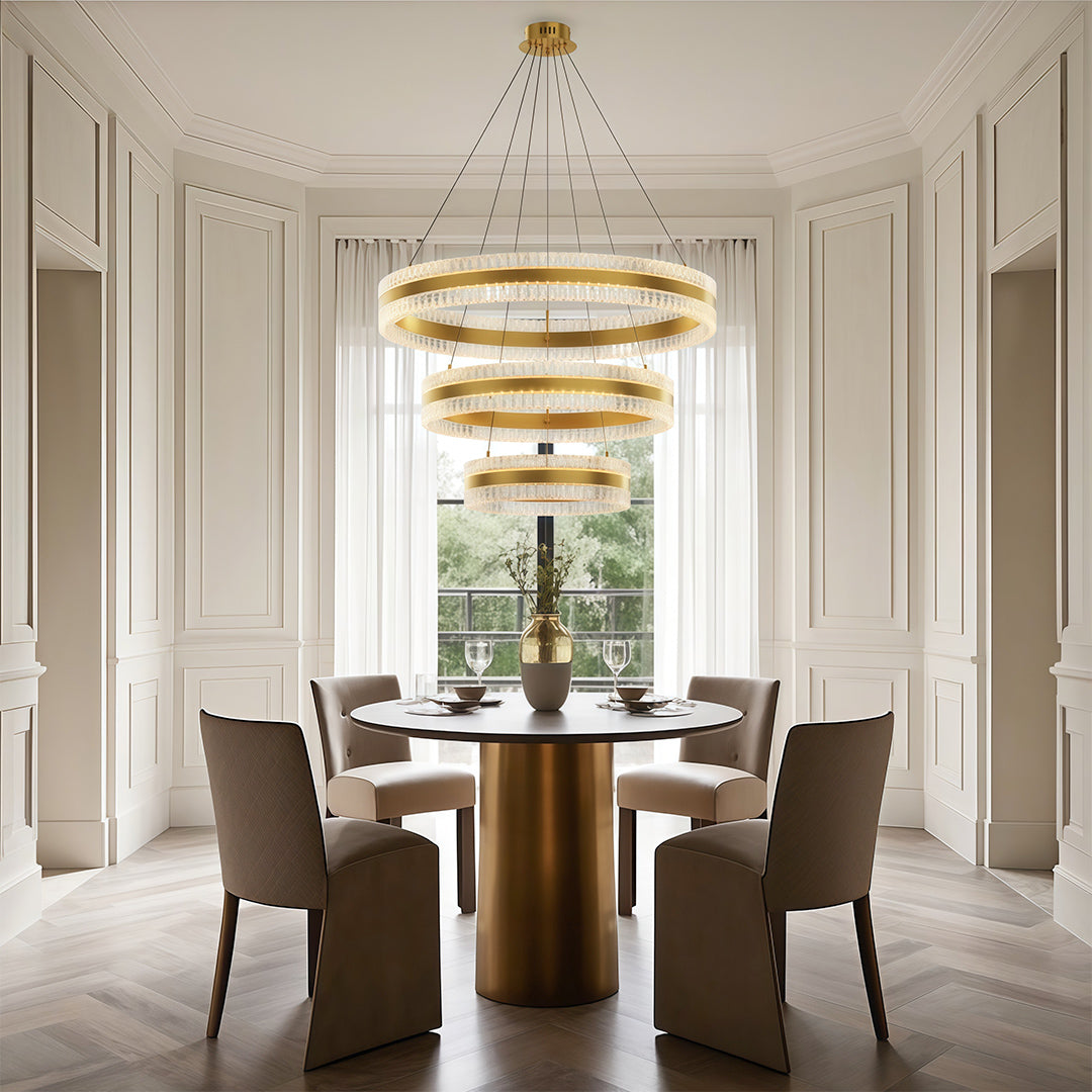Gold finish circular chandelier in a stylish dining room
