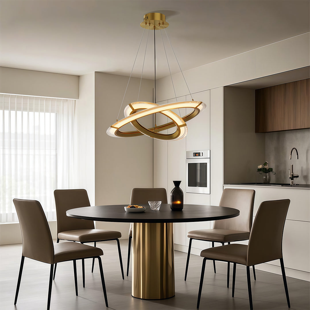 Round chandelier in a dining area with minimalist wooden accents