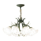 Elegant chandelier with white flowers on a green frame