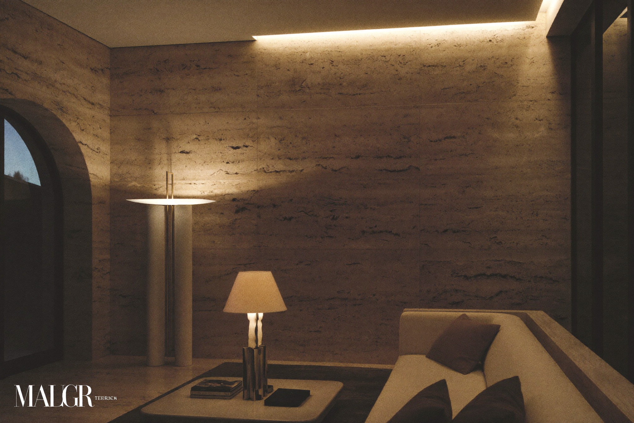 Lounge at night lit by layered warm lighting