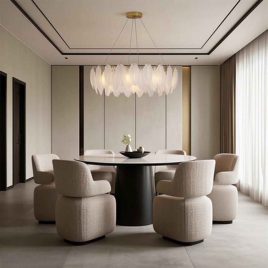 Feather chandelier in a cozy dining room with dark wood