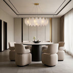 Feather chandelier in a cozy dining room with dark wood