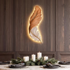 Illuminated feather wall art lamp as a dining room accent piece