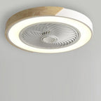 Flush mount bladeless ceiling fan glowing with warm LED light