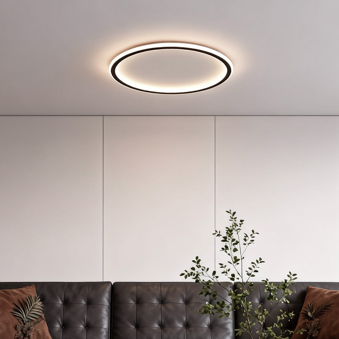 Flush mount LED circle ceiling light in a neutral room