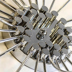 Close-up of the starburst arms and their small bulbs