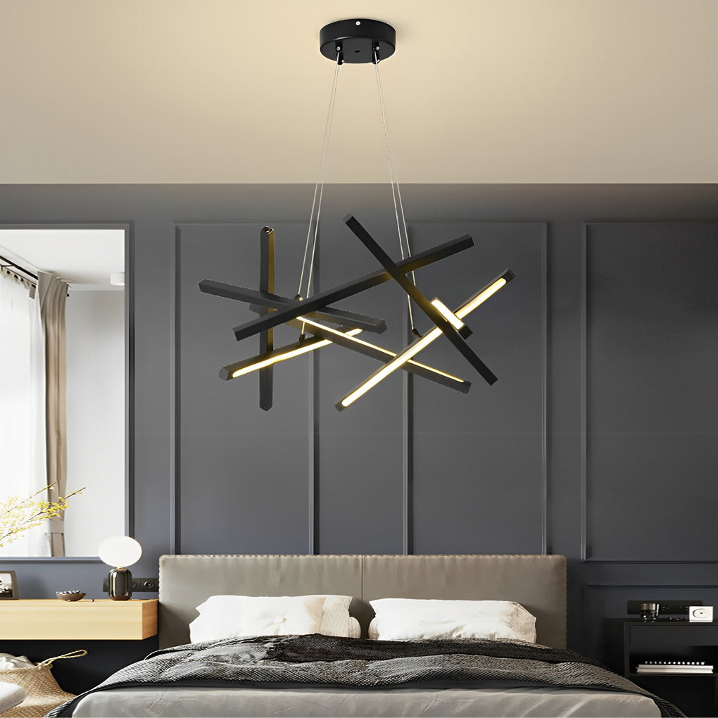 Black geometric ceiling light installed in a bedroom