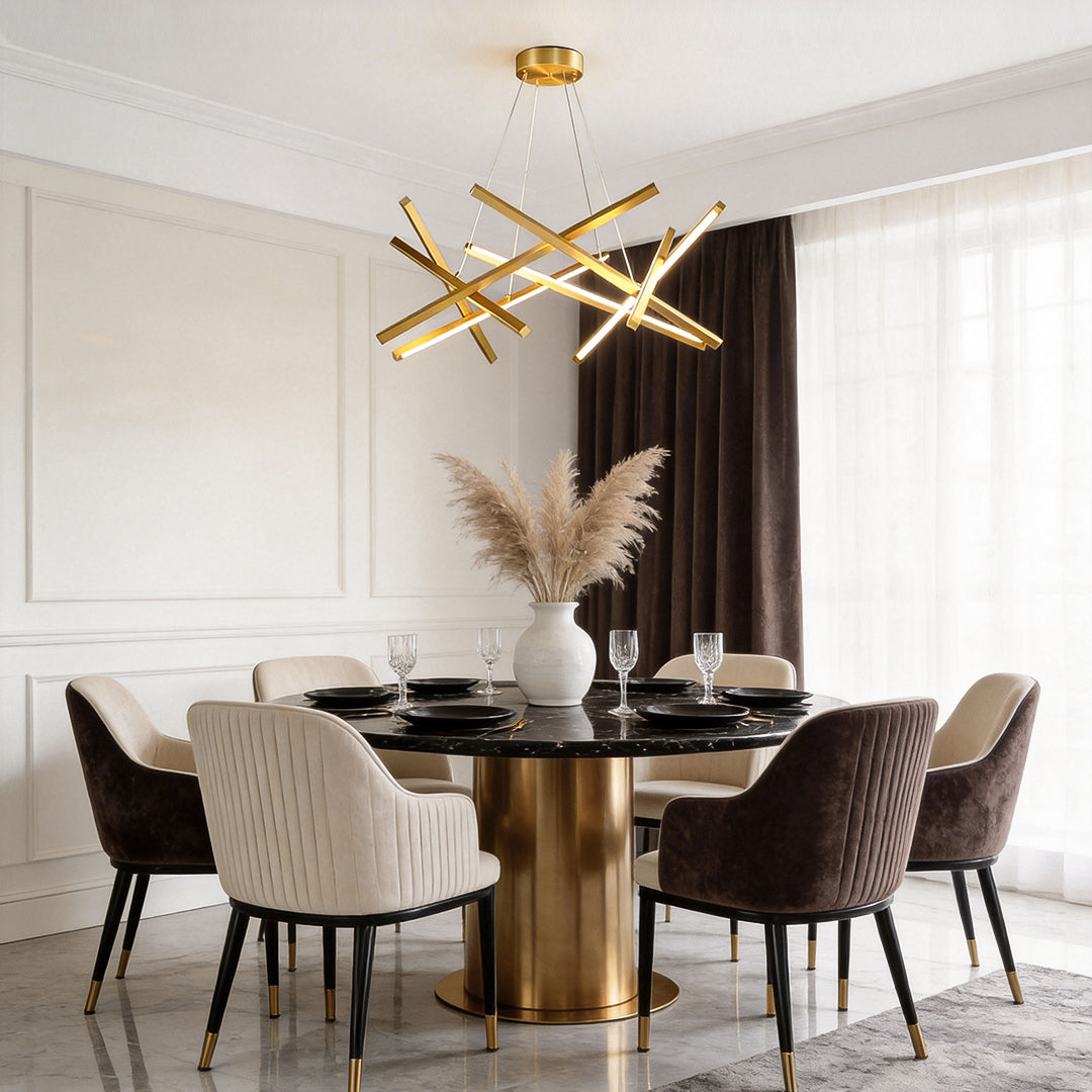 Gold geometric ceiling light in a dining room