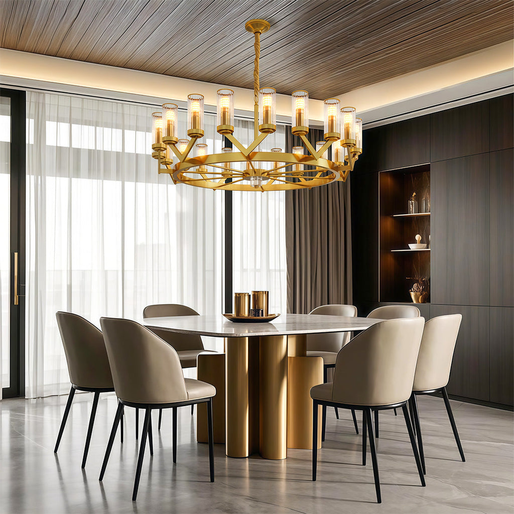 Glass drop chandelier hanging above modern designer chairs