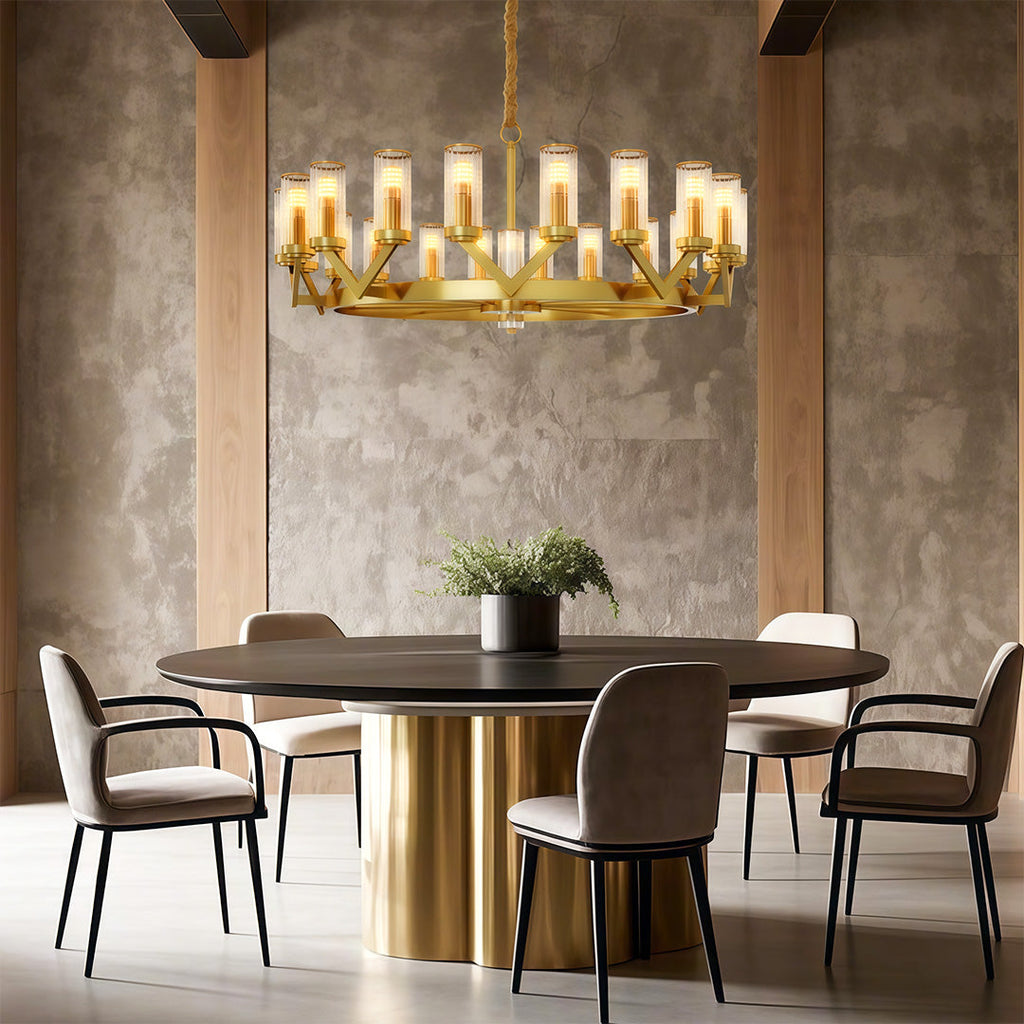 Glass drop chandelier above a warm textured gold table