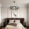 Glass ring chandelier hanging in a modern bedroom