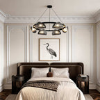 Glass ring chandelier hanging in a modern bedroom