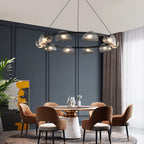 Glass ring chandelier giving ambient light in a living room