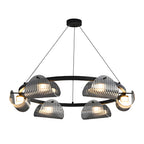 Sleek metal glass ring chandelier in a contemporary dining room