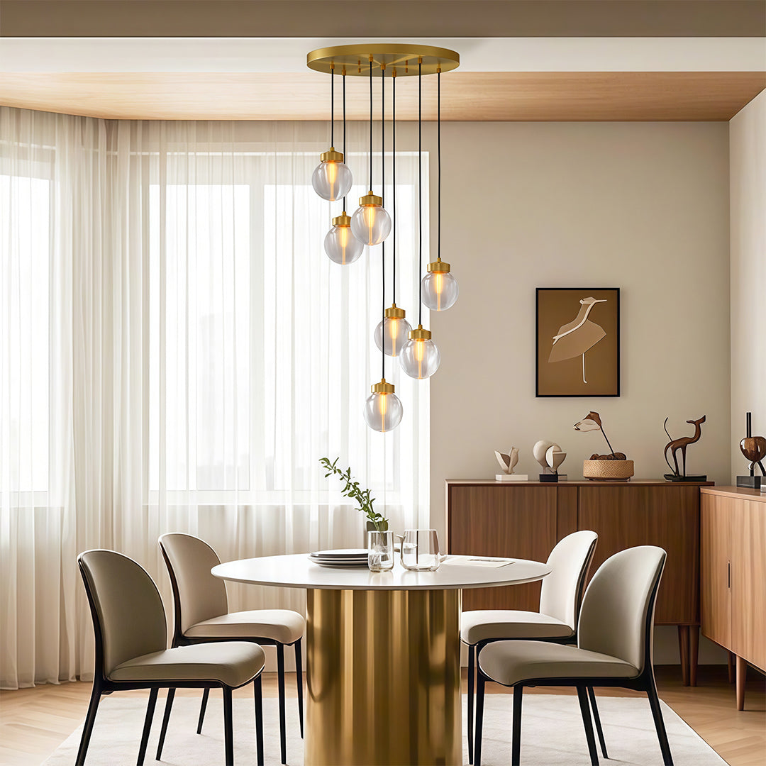 Glass semi flush light above a round wooden dining table