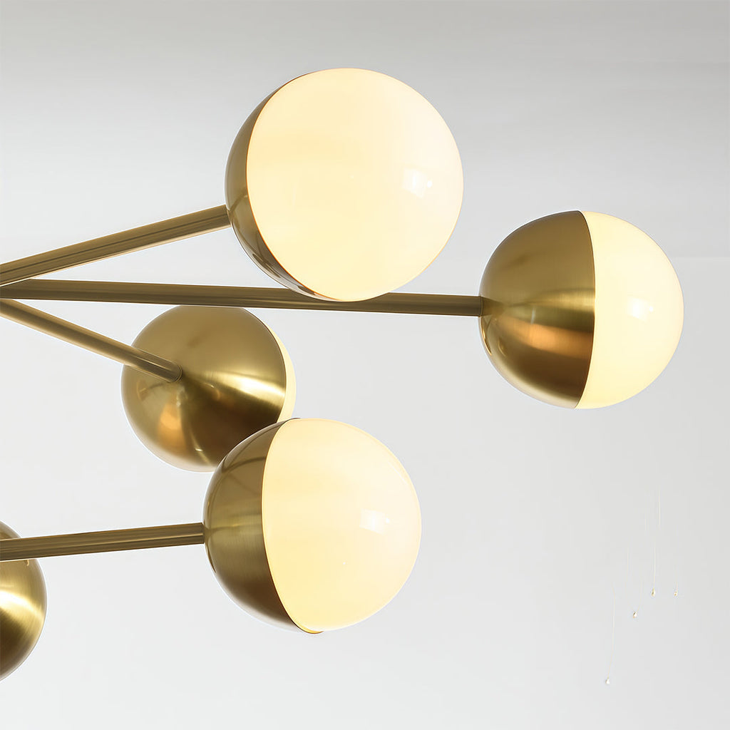 Close-up of the brass arm and white glass globe