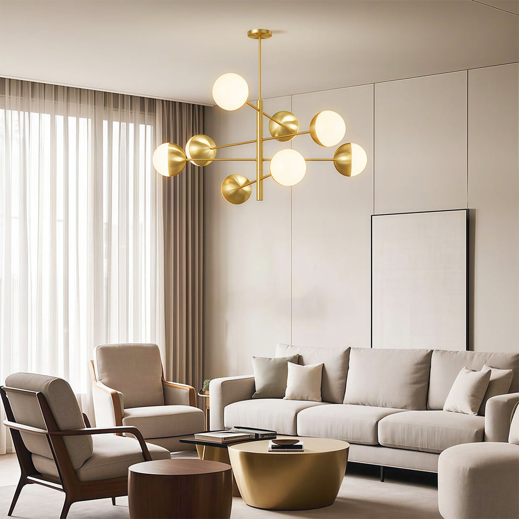 Globe chandelier in an elegant living room with a curved sofa