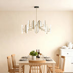 Gold cluster chandelier in a bright kitchen with natural wood