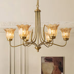 Gold glass chandelier used as a decorative light in a kitchen