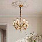 Gold glass drop chandelier with cylindrical shades