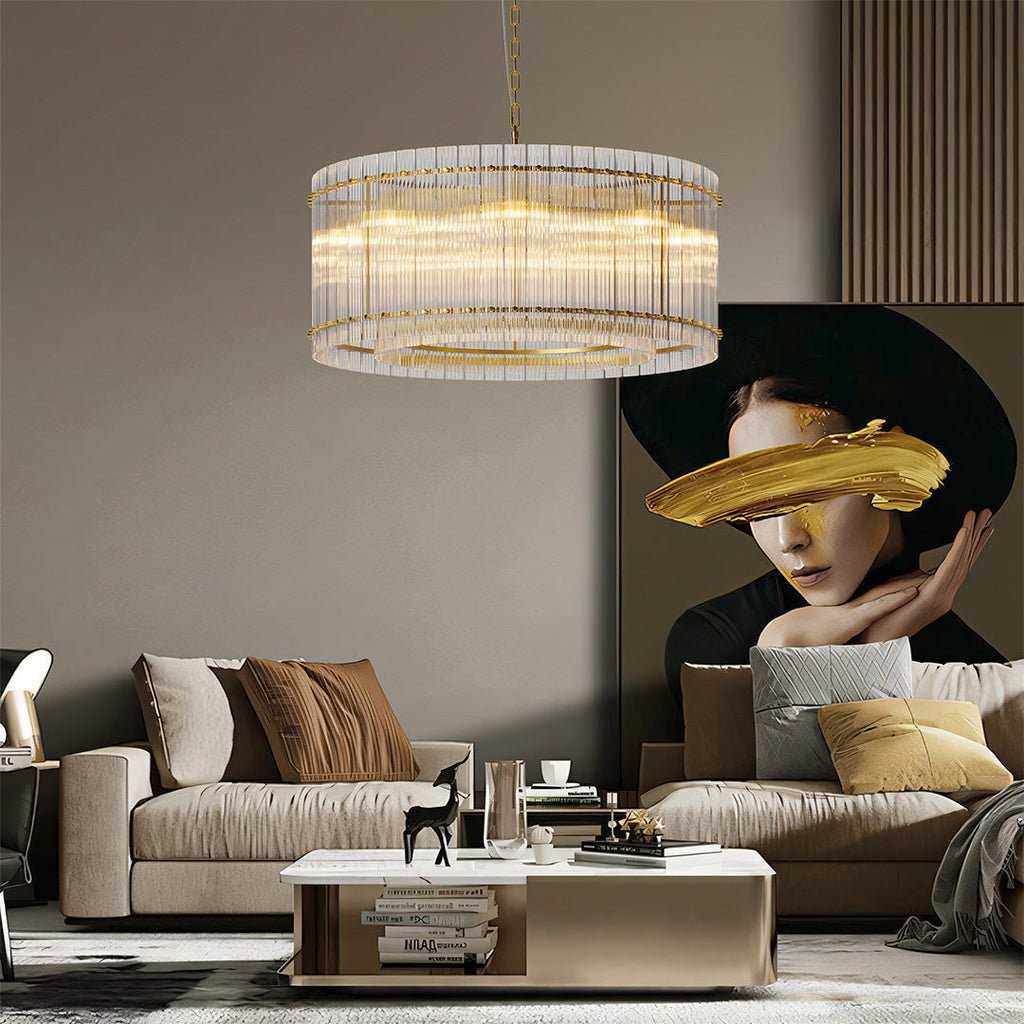 Gold drum chandelier hanging in a living room