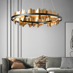 Black and gold leaf chandelier in a contemporary space