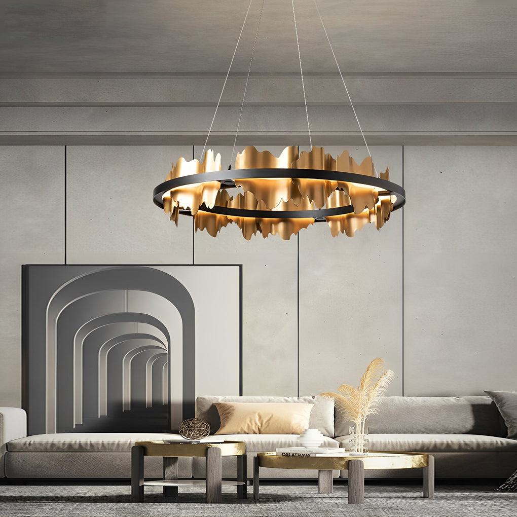 Circular gold leaf chandelier in a modern dining room