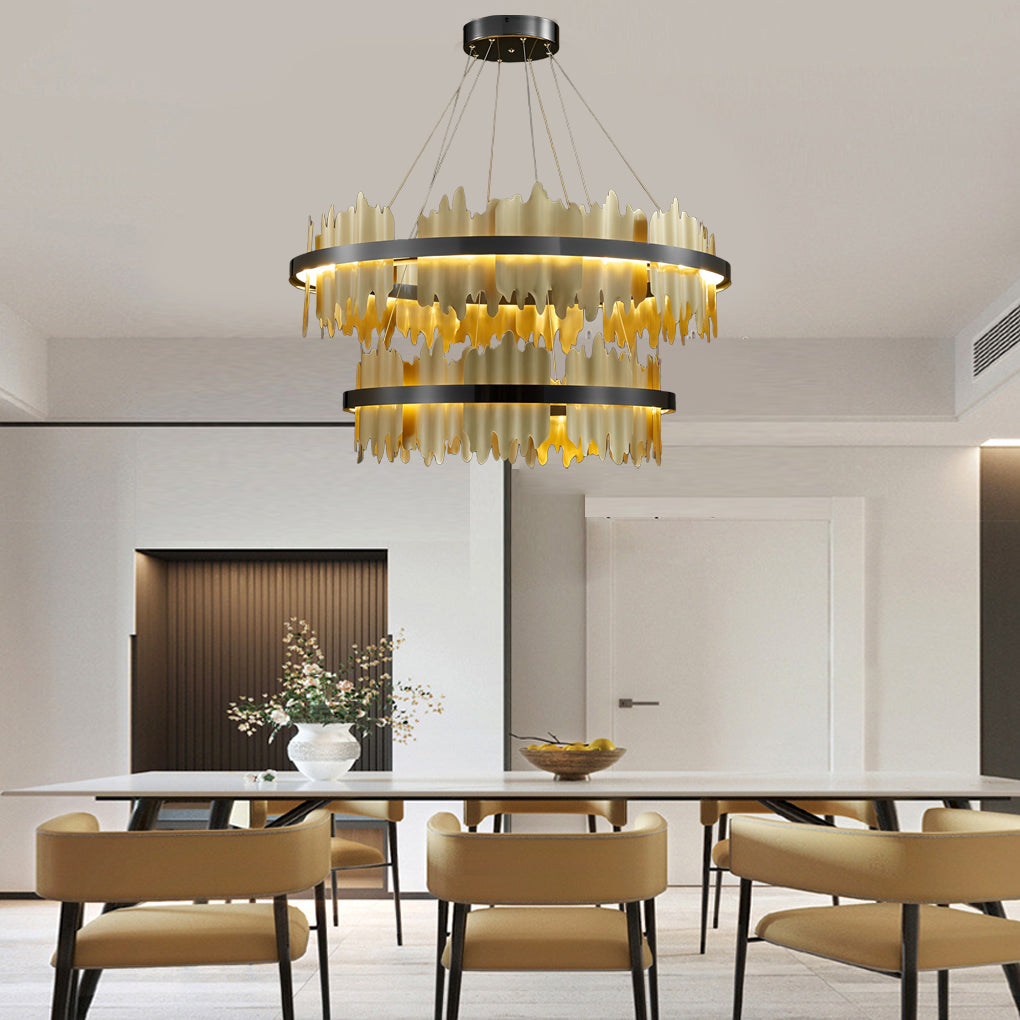 Gold leaf chandelier giving warm light in a cozy living room