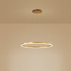 Gold LED ring chandelier isolated on a yellow background