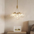 Gold bubble chandelier with a textured glass cluster