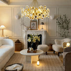 Gold chandelier giving ambient light in a luxury living room