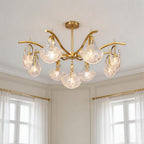 Gold shell chandelier with textured clear glass shades