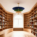 Grand felt chandelier in a curved home library