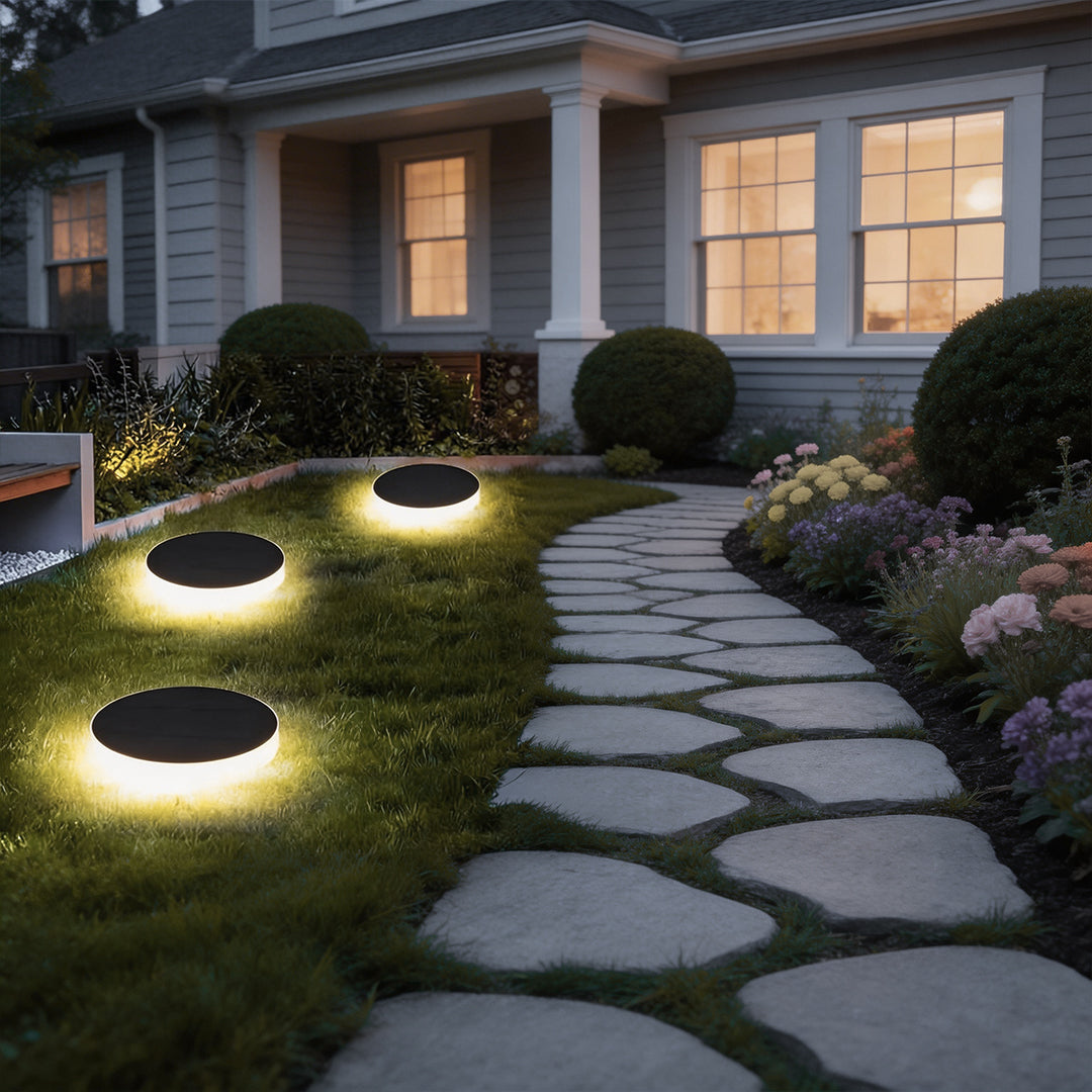 In-ground solar lights lighting a contemporary house entrance
