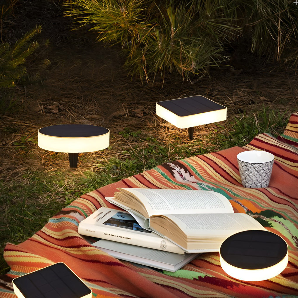 In-ground solar lights giving warm light around a poolside