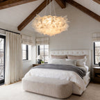 Petal pendant light giving warm light in a cozy bedroom