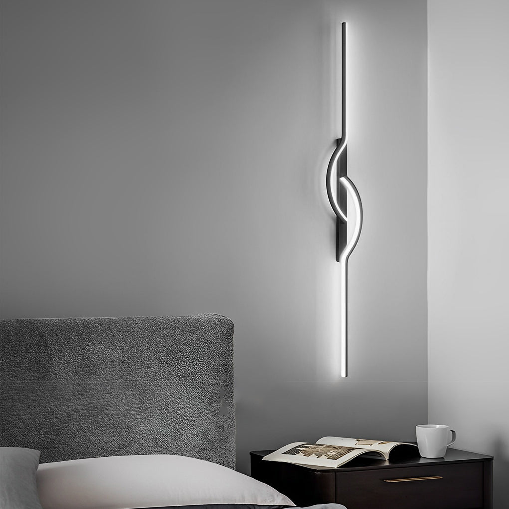 Horizontally mounted linear wall sconce in a bedroom