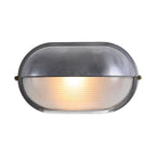 Horizontally mounted oval bulkhead light with ribbed glass